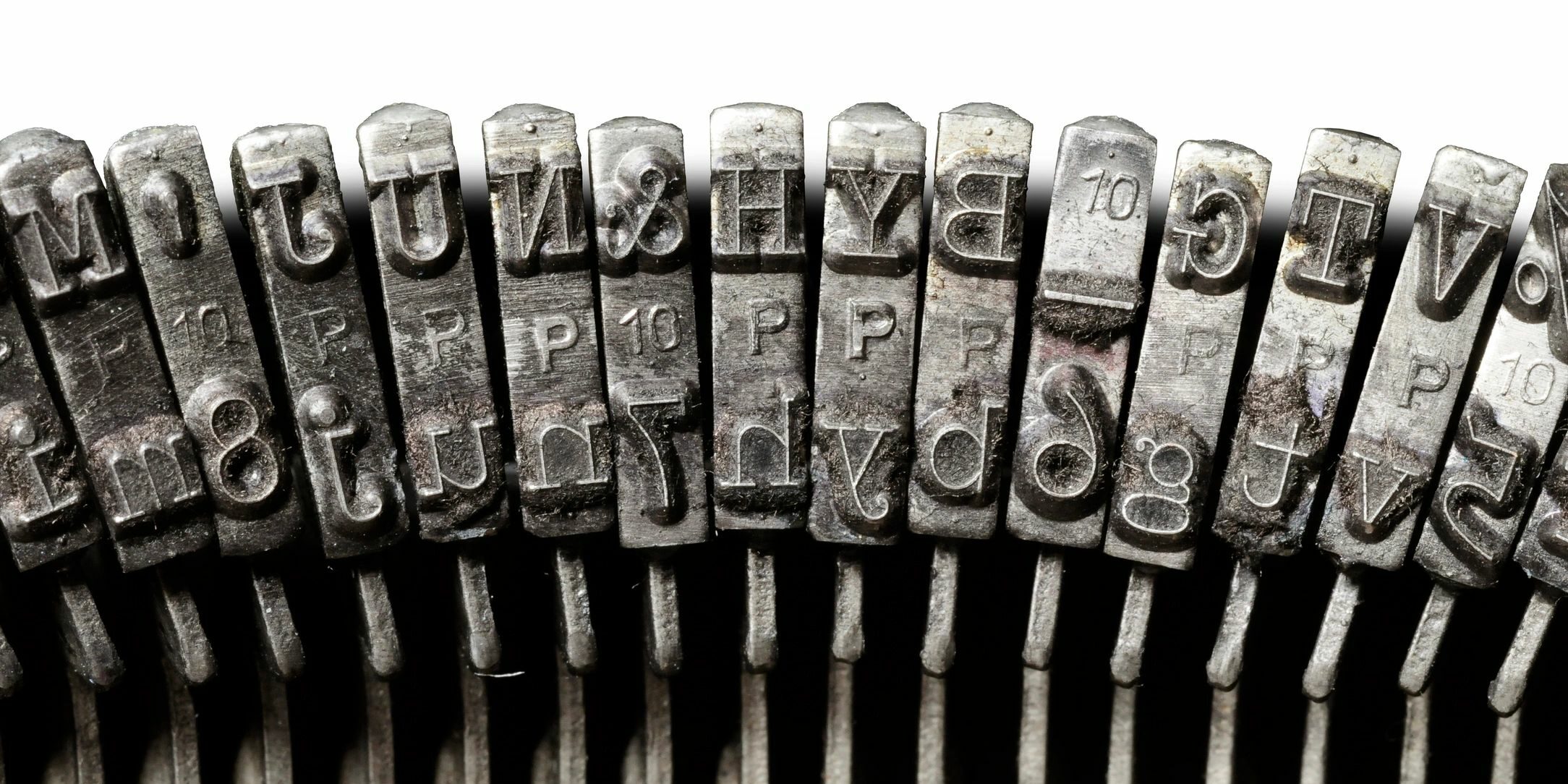 image of keys on an old-fashioned keyboard