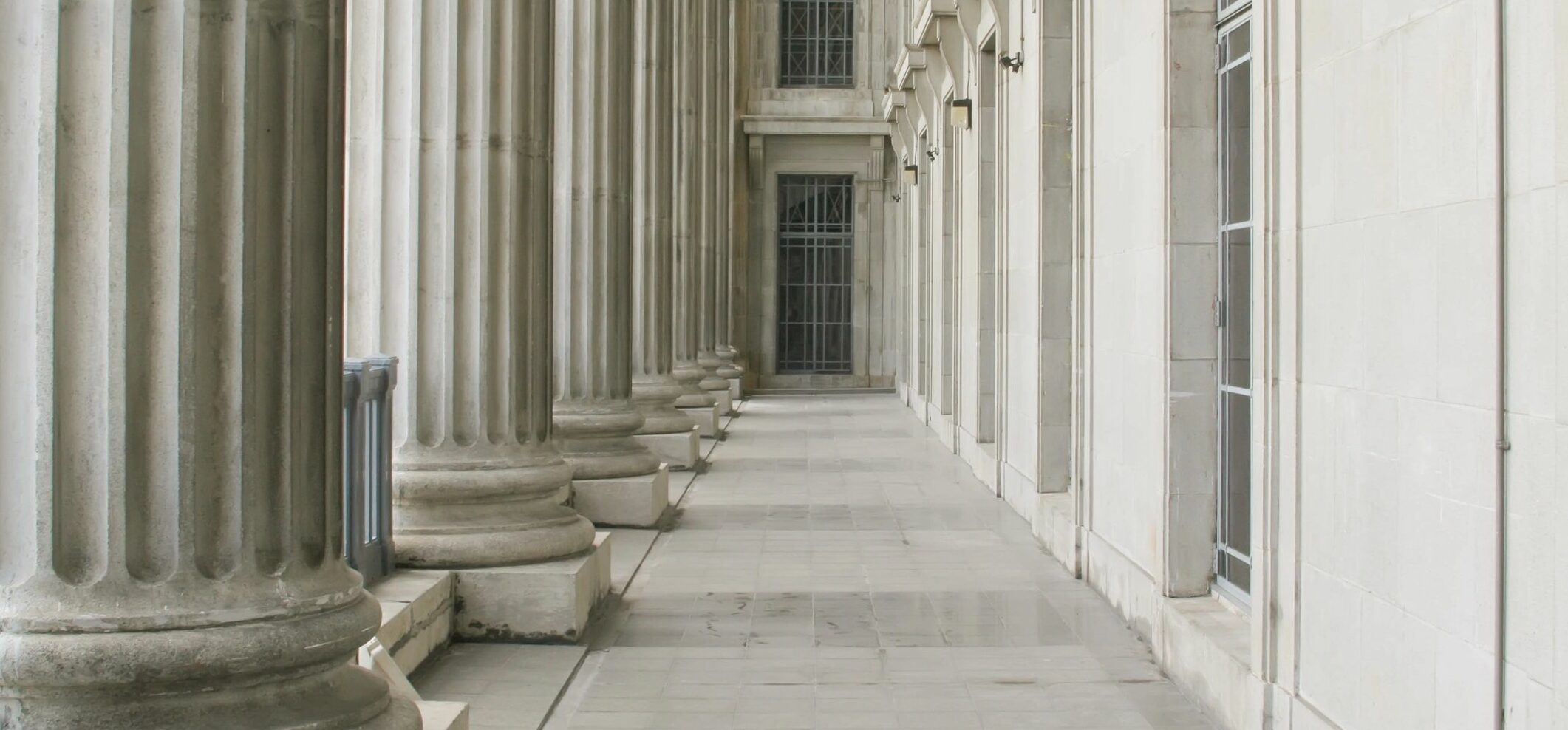 image of stately columns and windows on a government building