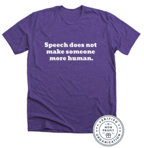 Purple t-shirt with the words "Speech does not make someone more human."