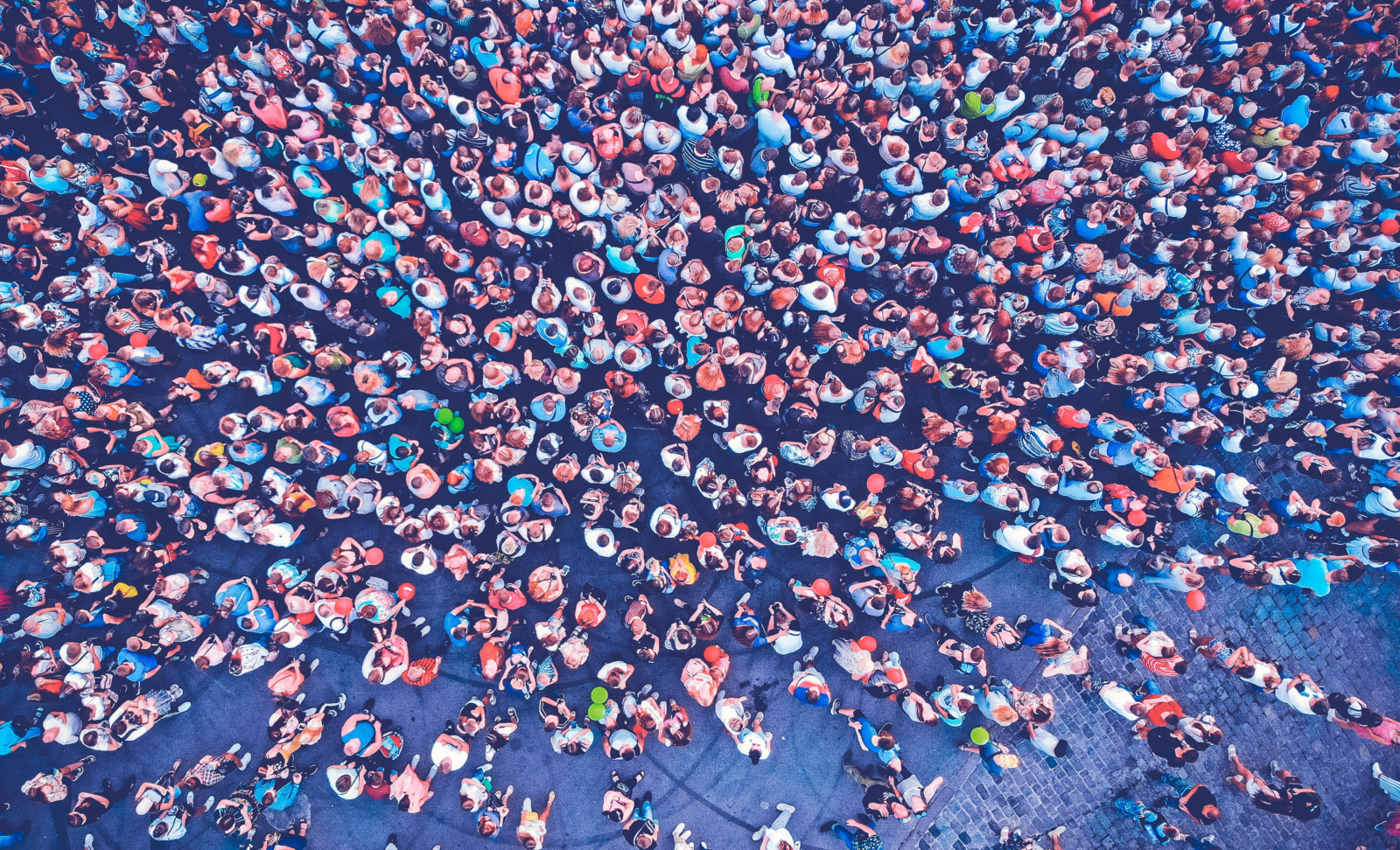 Stock photo of a crowd viewed from above